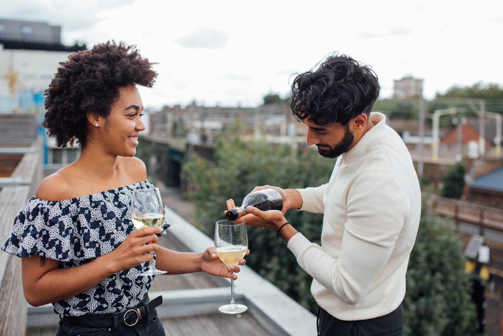 couple enjoying wine having fun dating