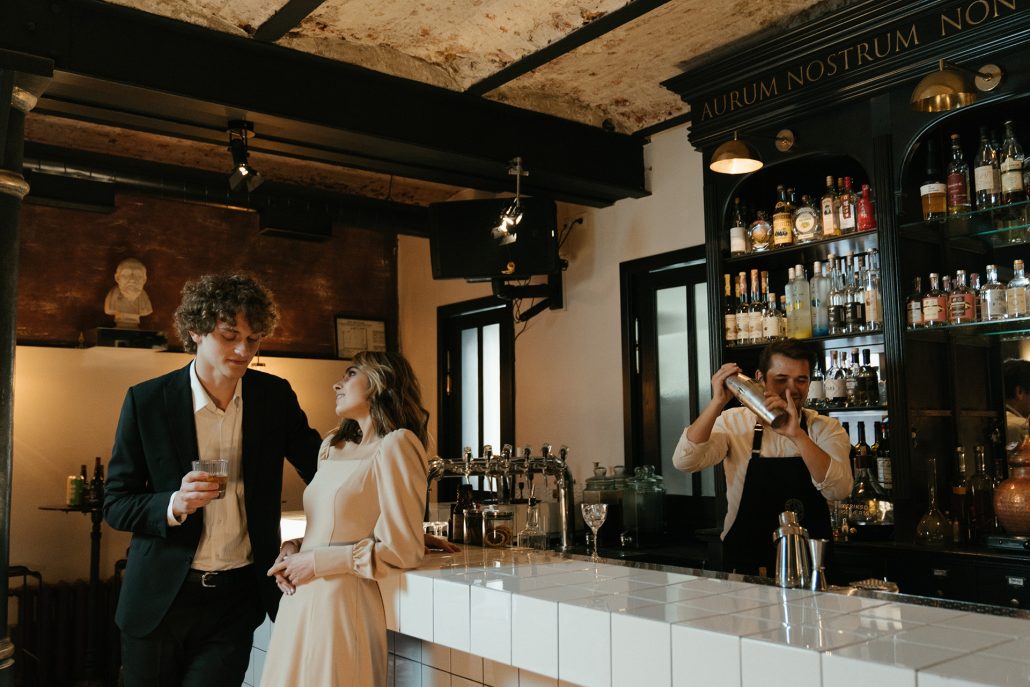 man and women talking in bar